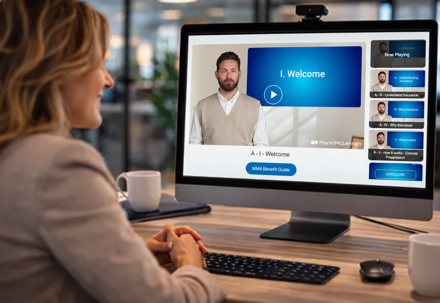 An employee learning about benefits through a customized video dashboard